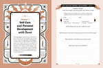Open pages showing guided tarot journaling prompts and writing space