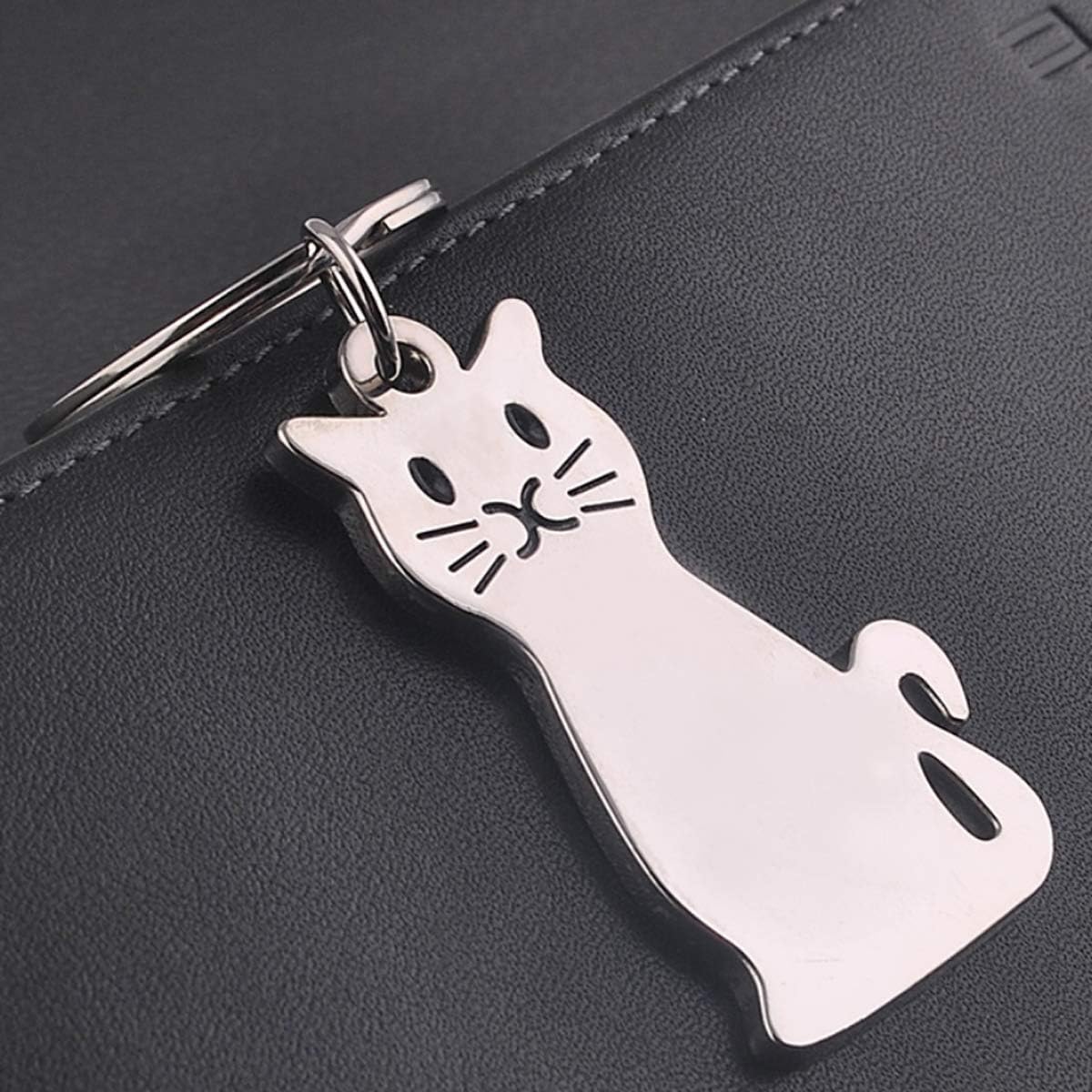 Elechobby Cat Keyring displayed next to its elegant black gift pouch packaging