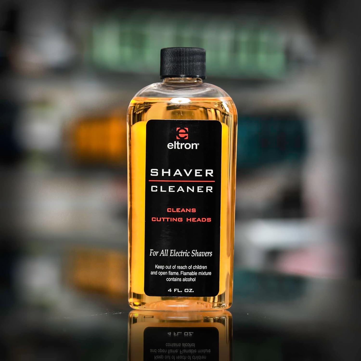 Norelco Eltron 55 Shaver Head Cleaner 4 fluid ounce bottle front view for electric razors.