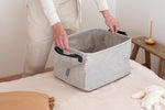 Brabantia grey laundry bin used for toy and accessory storage