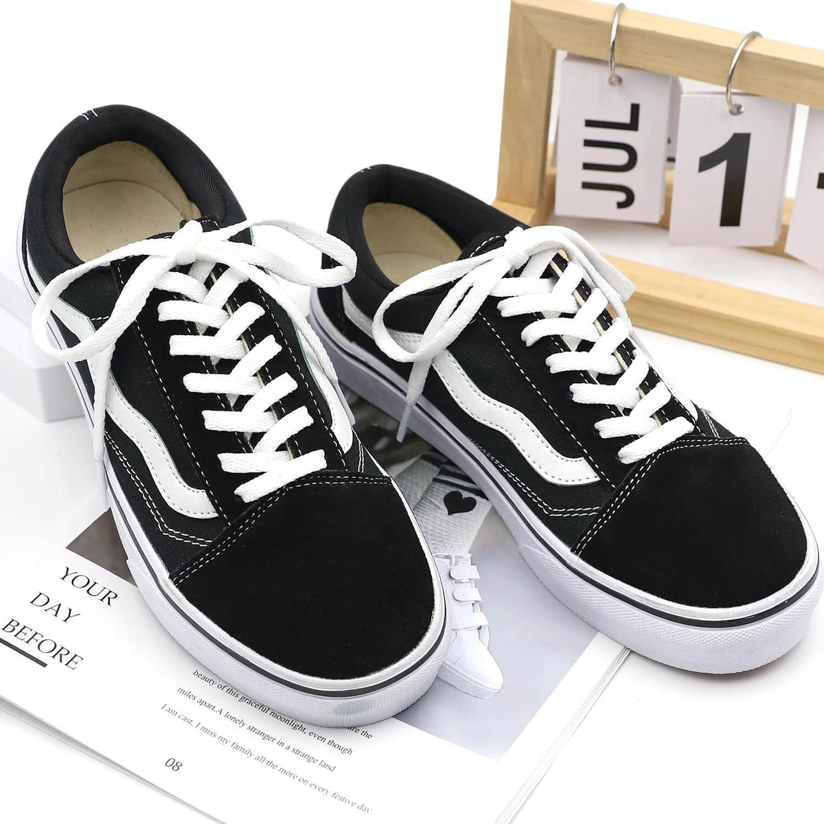 White flat shoelaces styled on modern fashion sneakers
