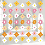 Pasimy groovy daisy boho party decorations front view showcasing eight pastel paper garland strands.