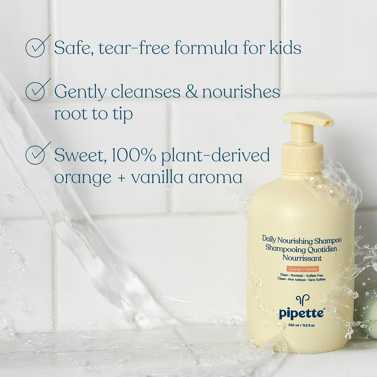 Pipette 11.2 fluid ounce shampoo bottle held in hand