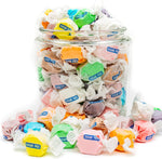 Individual wrapped colorful sugar free taffy pieces close up