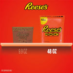 Gluten free peanut butter candies by Reese's scattered on a table