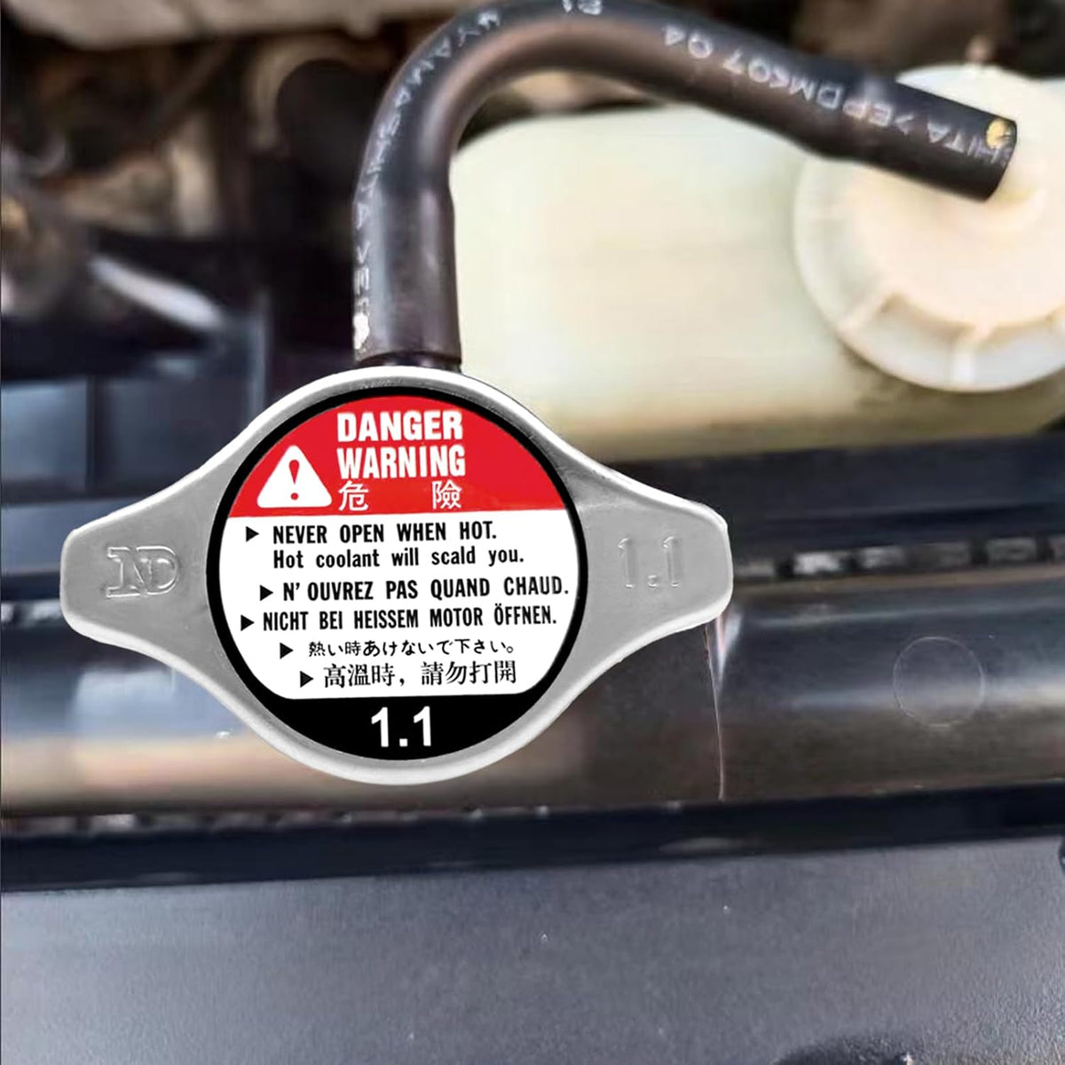 Installed view of radiator cap on compatible vehicle cooling system