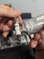 Permatex dielectric grease applied on spark plug boot