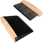 Nokiils small dust pan and brush set front view showing black metal scoop and wooden brush handle