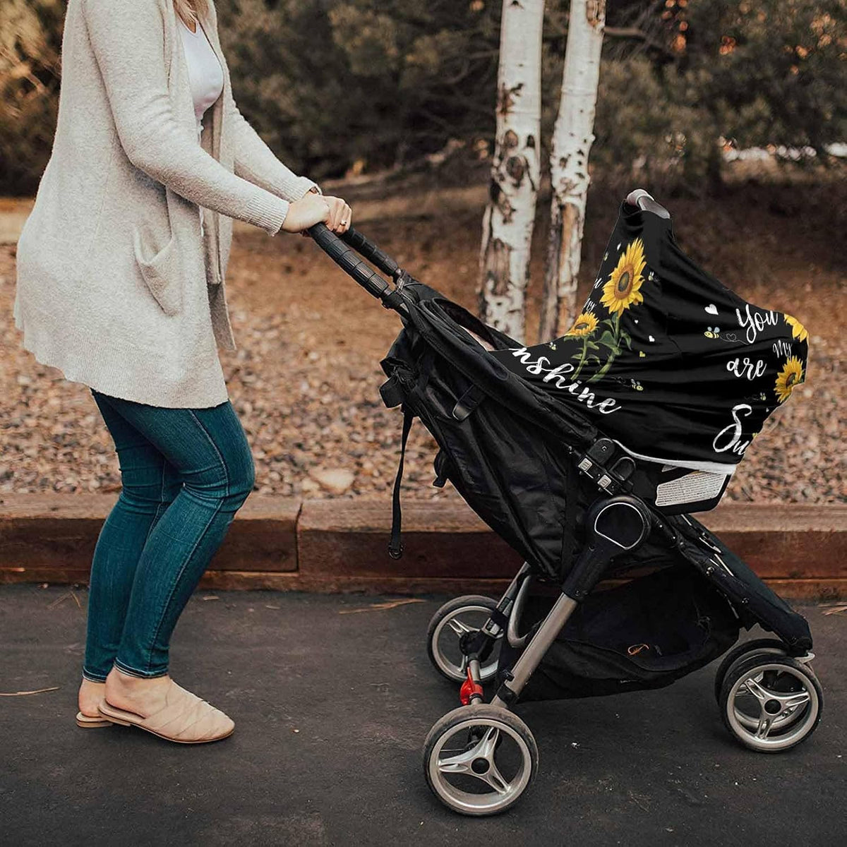 LBCASA infant car seat cover fitted securely over a modern baby stroller.