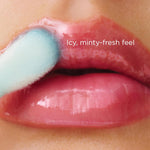 Clarins Lip Comfort Oil lifestyle application shot