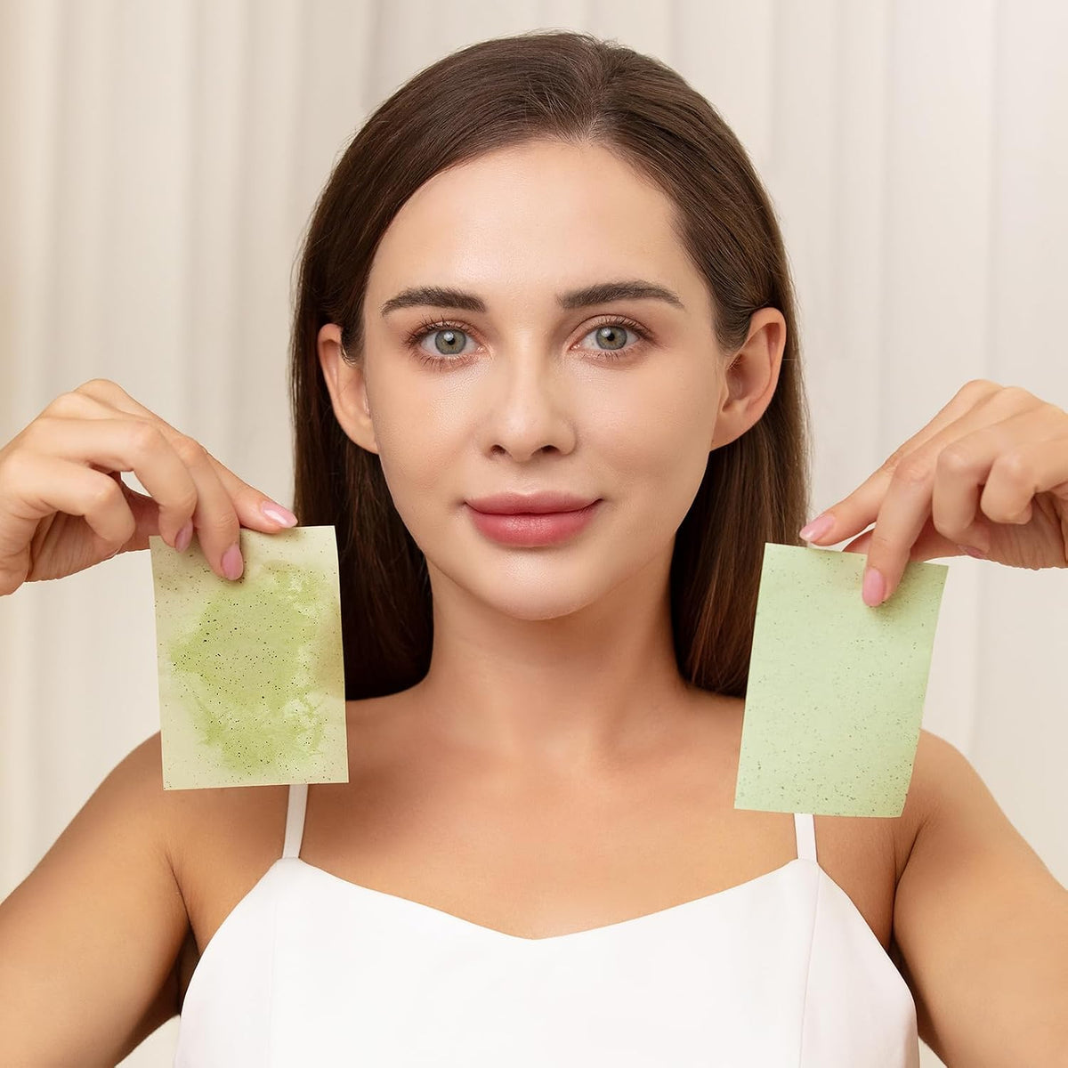 Teenitor oil control sheets demonstration on skin