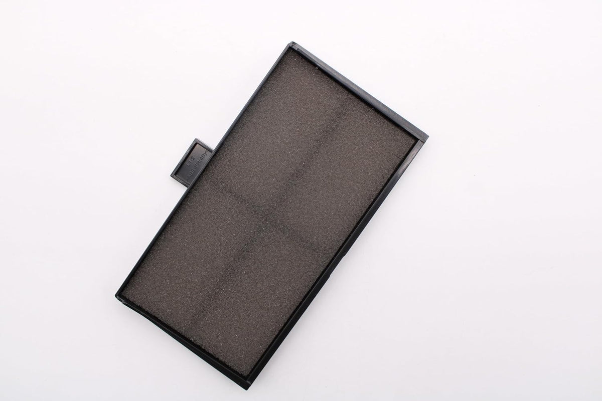 Side angle view of projector dust filter replacement unit