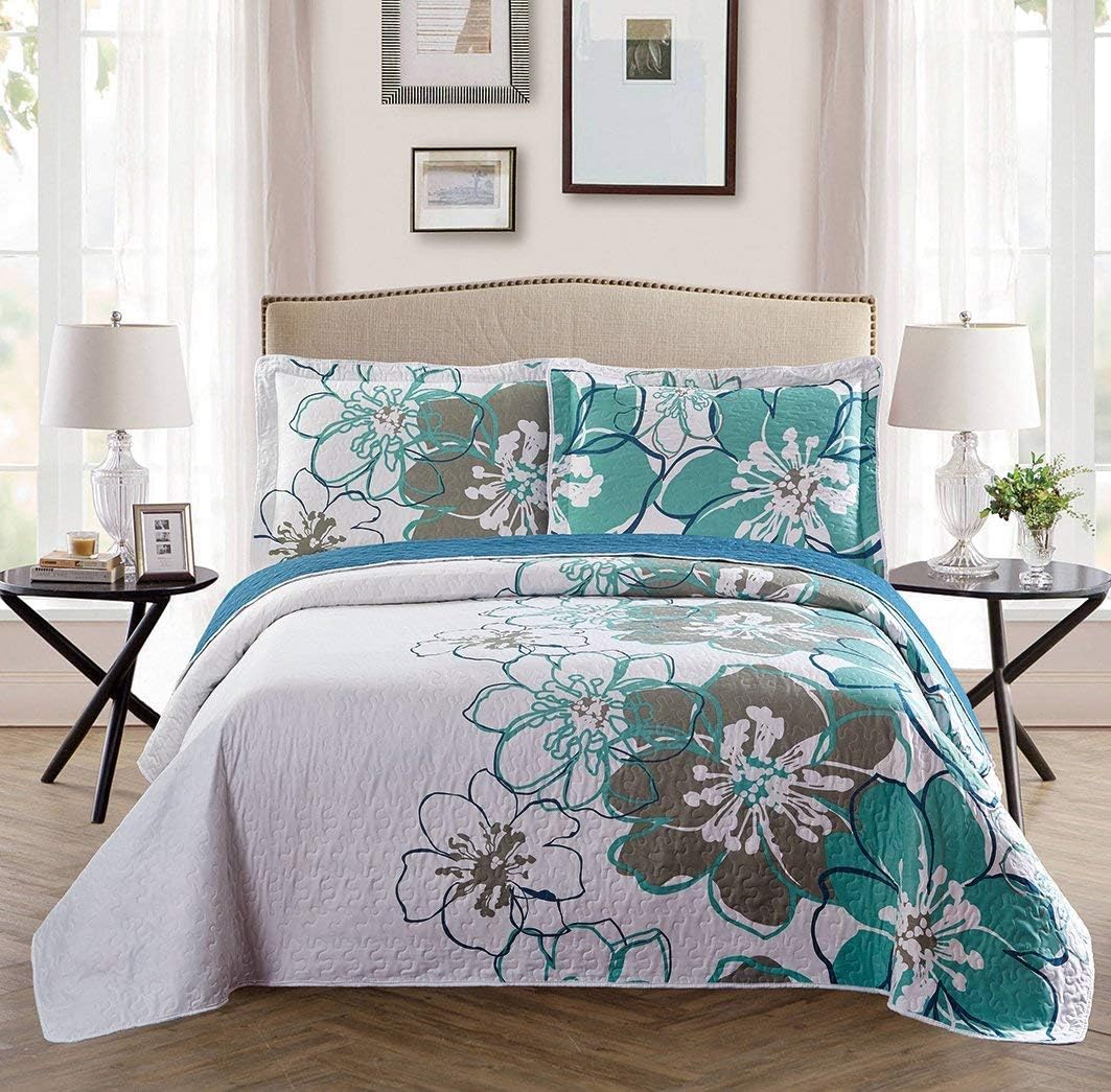 Fancy Linen 3 piece floral bedspread set on a queen bed.