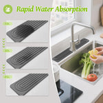 Gray stone faucet tray placed around kitchen tap
