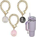 Water bottle handle decorated with gold initial letter charm
