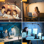 Ailbton architect lamp illuminating a multi-monitor workstation