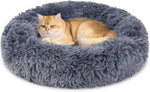 Small puppy resting in Rainflow donut calming bed