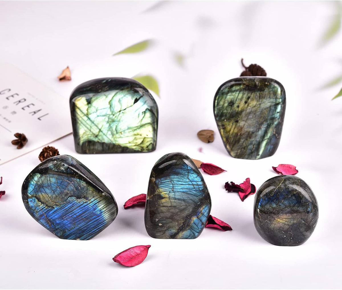 Jic Gem decorative reiki stone positioned on wooden desk surface.