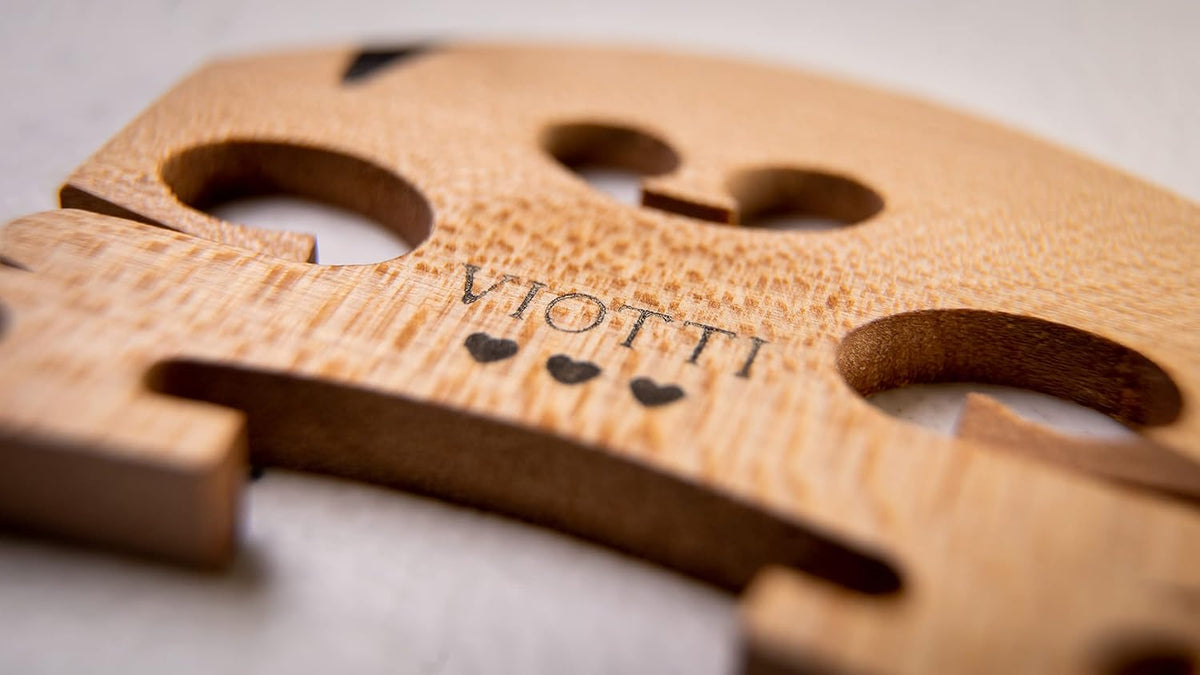 Viotti violin bridge close-up of genuine ebony E-string insert