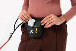 OllyDog imported dog training pouch with orange carabiner attachment