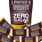 Individually wrapped sugar-free Hershey miniatures scattered next to the original imported 15.5-ounce packaging.