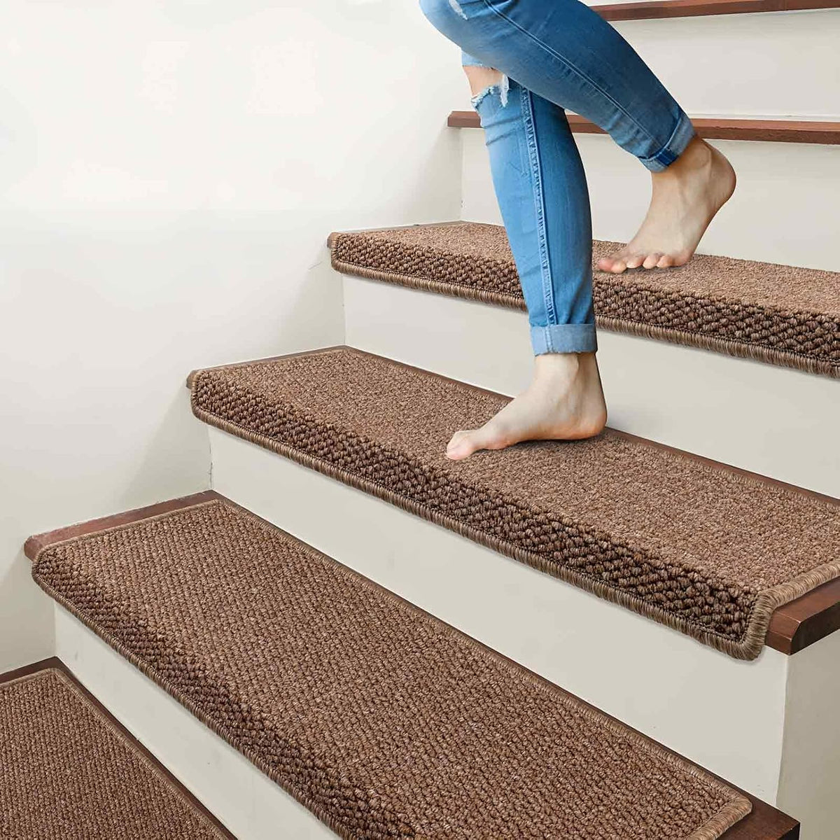 Brakki non slip stair mats installed on wooden steps