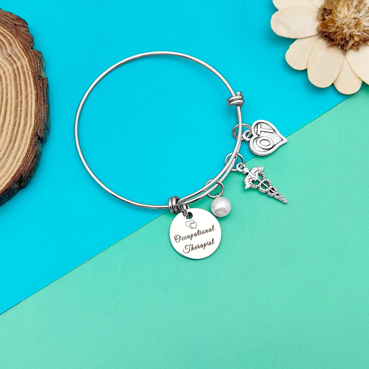 Dabihu assistant gift charm bracelet close up of heart pendant