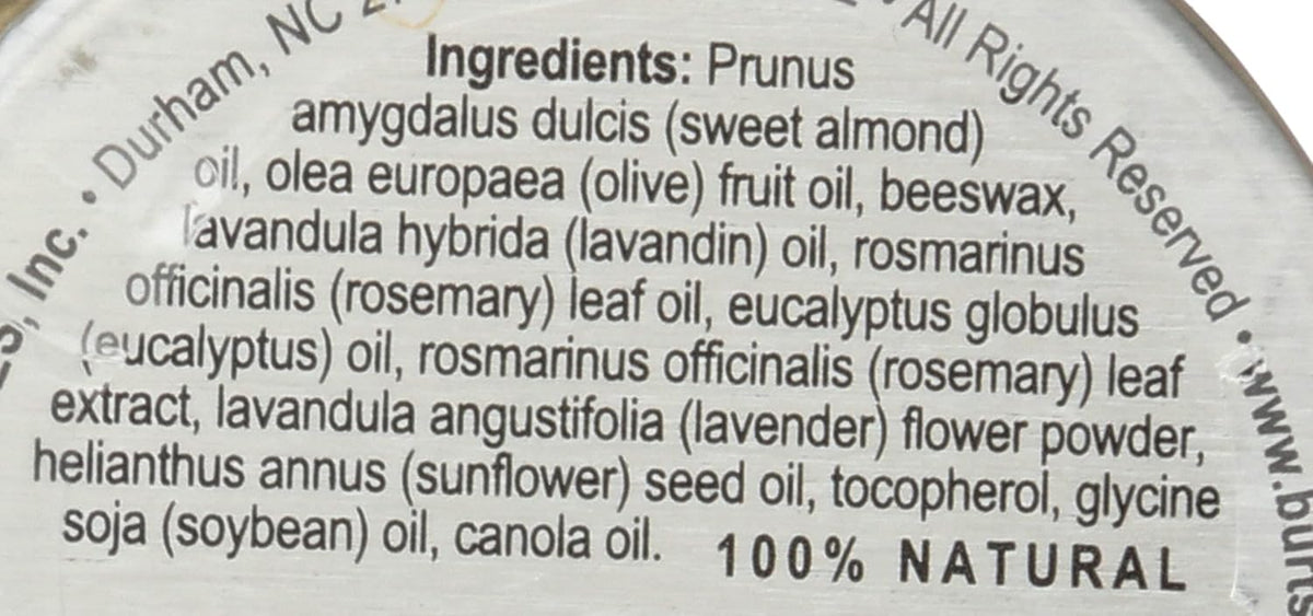Burt's Bees hand salve tin next to natural ingredients