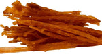 All natural rawhide free turkey tendon sticks for dogs showing fibrous texture.