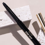 Cruelty-free imported Milani cosmetics eyebrow pencil demonstrating dual functionality.