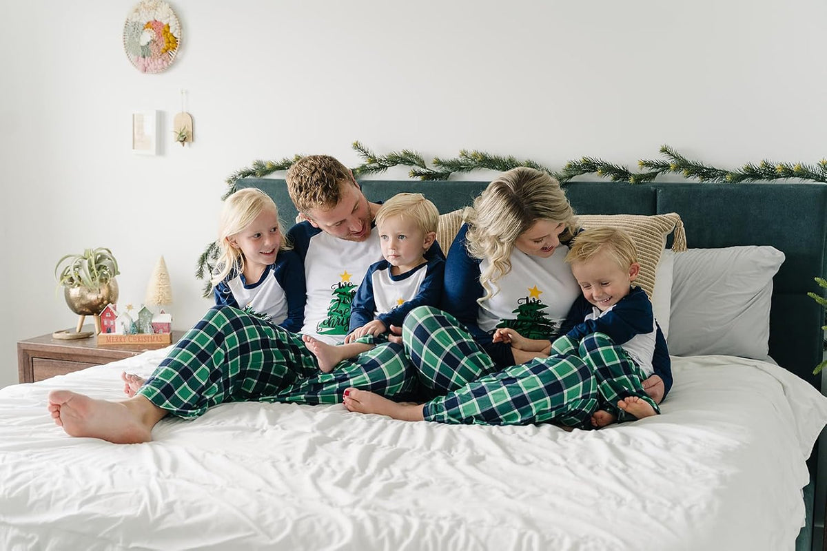 IFFEI matching Christmas pajamas worn by adult model