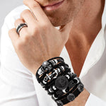Dystud black braided leather wrist band angled view highlighting craftsmanship