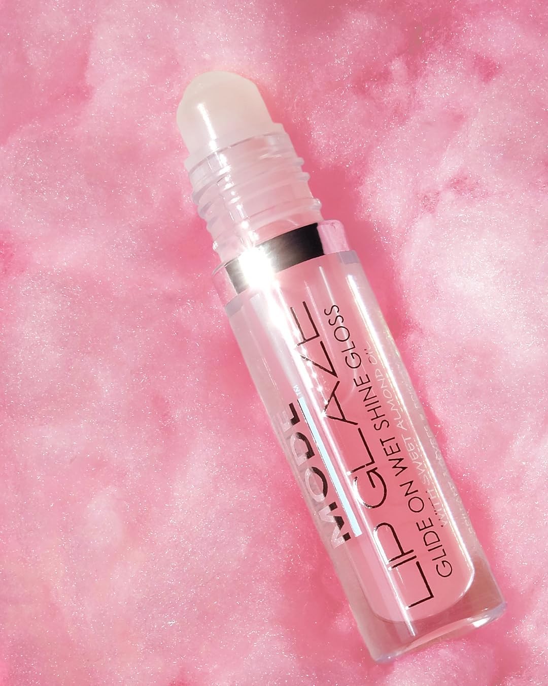 Mode Cosmetics rollerball lip gloss showing applicator tip