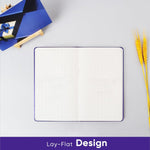 Fleekool purple grid notebook side profile showing page thickness