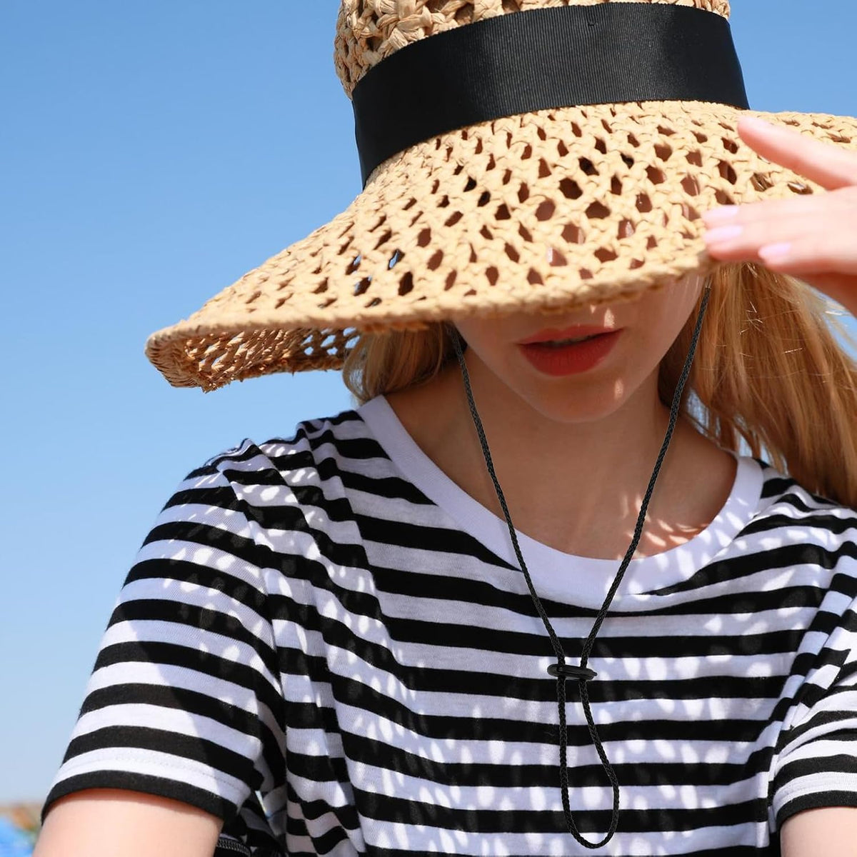Salbsever hat strap clips attached to a cap