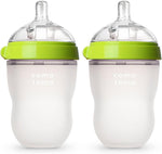 Comotomo baby bottle pink set arranged for daily feeding