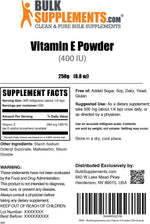 BulkSupplements Vitamin E powder being measured for daily dietary use