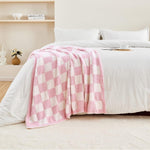 CozeCube fluffy microfiber knitted blanket folded on a modern sofa