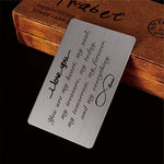 FALOGIJE stainless steel wallet card inside a leather wallet slot