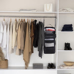 Olosar suitcase organizer hanging inside a hotel wardrobe