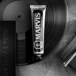 Marvis licorice mint flavor concentrated toothpaste tube displaying plaque and tartar control benefits