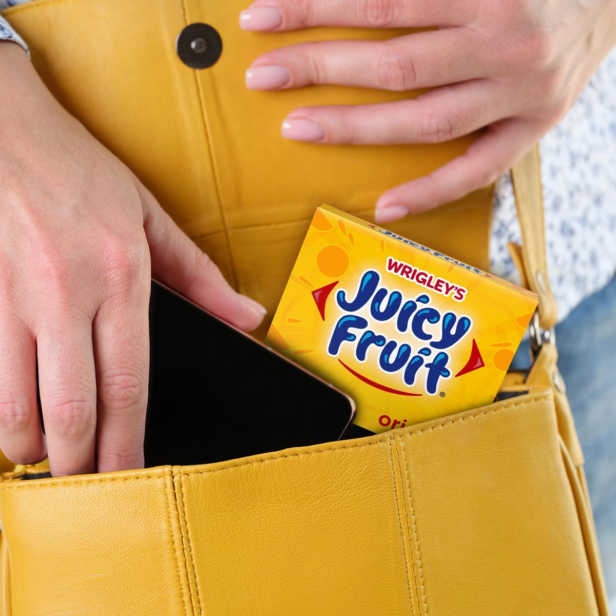 Back view of the Juicy Fruit chewing gum bulk packaging displaying ingredient information.
