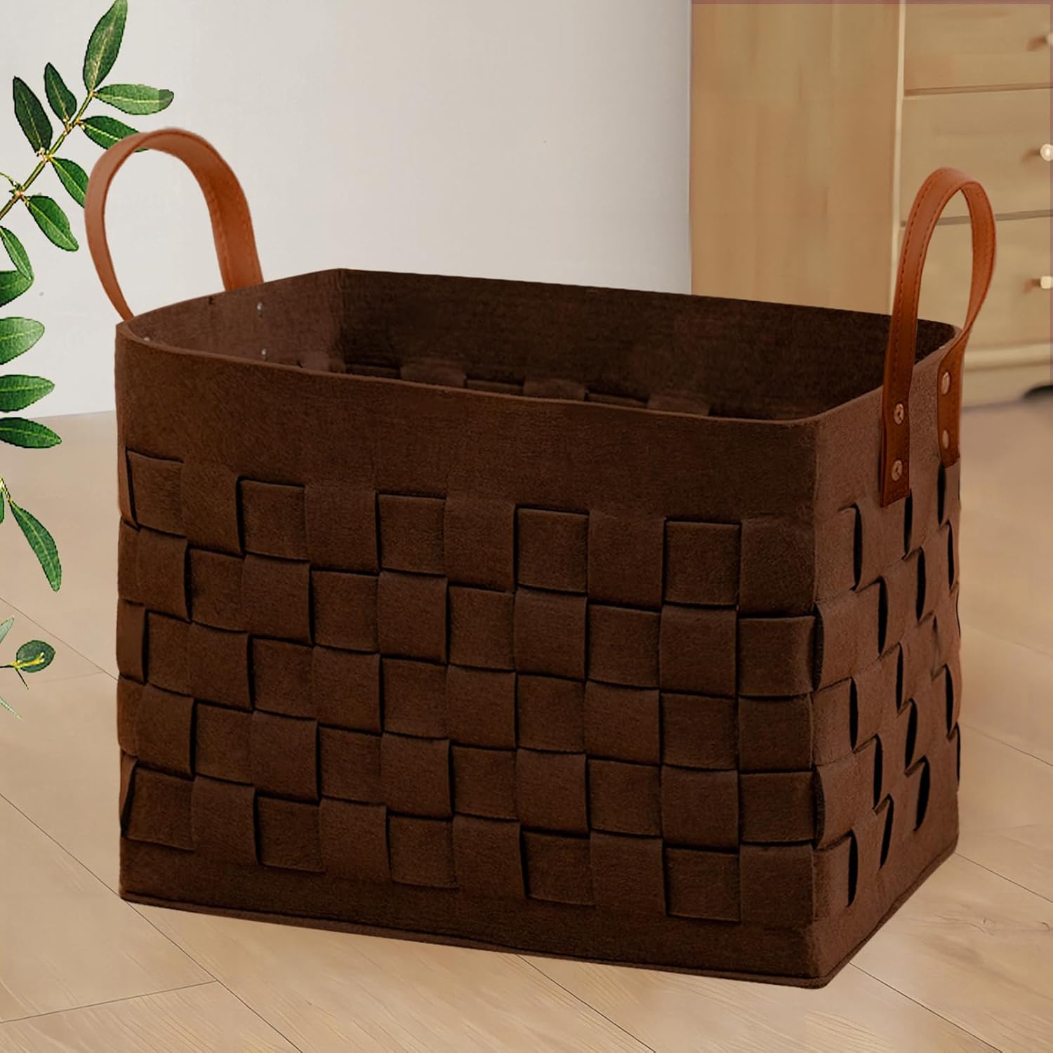 Boldmonkey laundry basket front view in wood brown felt fabric with premium leather handles.