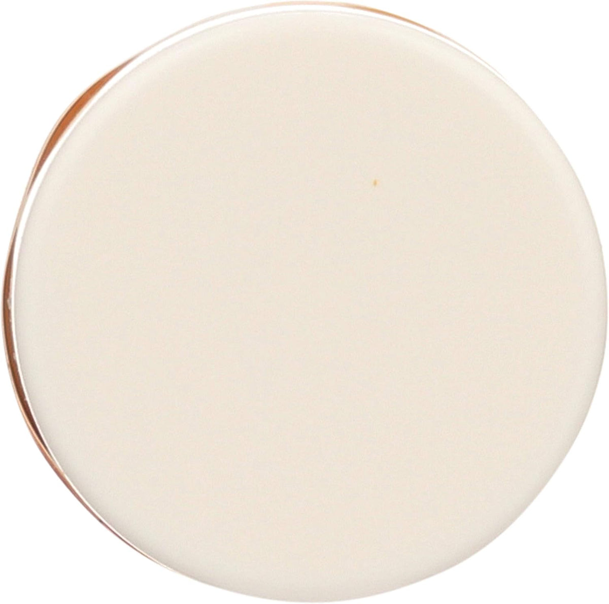 Close-up of Burt's Bees coconut and pear lip balm texture and cap