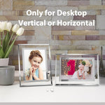 Set of four silver picture frames arranged for tabletop display