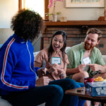 Usaopoly Blank Slate players writing on slates