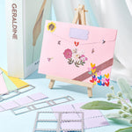 Postage stamp border cutting dies placed on colorful cardstock
