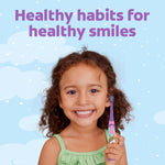 Colgate vibrating kids toothbrush in use lifestyle angle