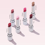Close-up view of the Clarins lip balm base featuring clean aesthetics and luxury formulation details.