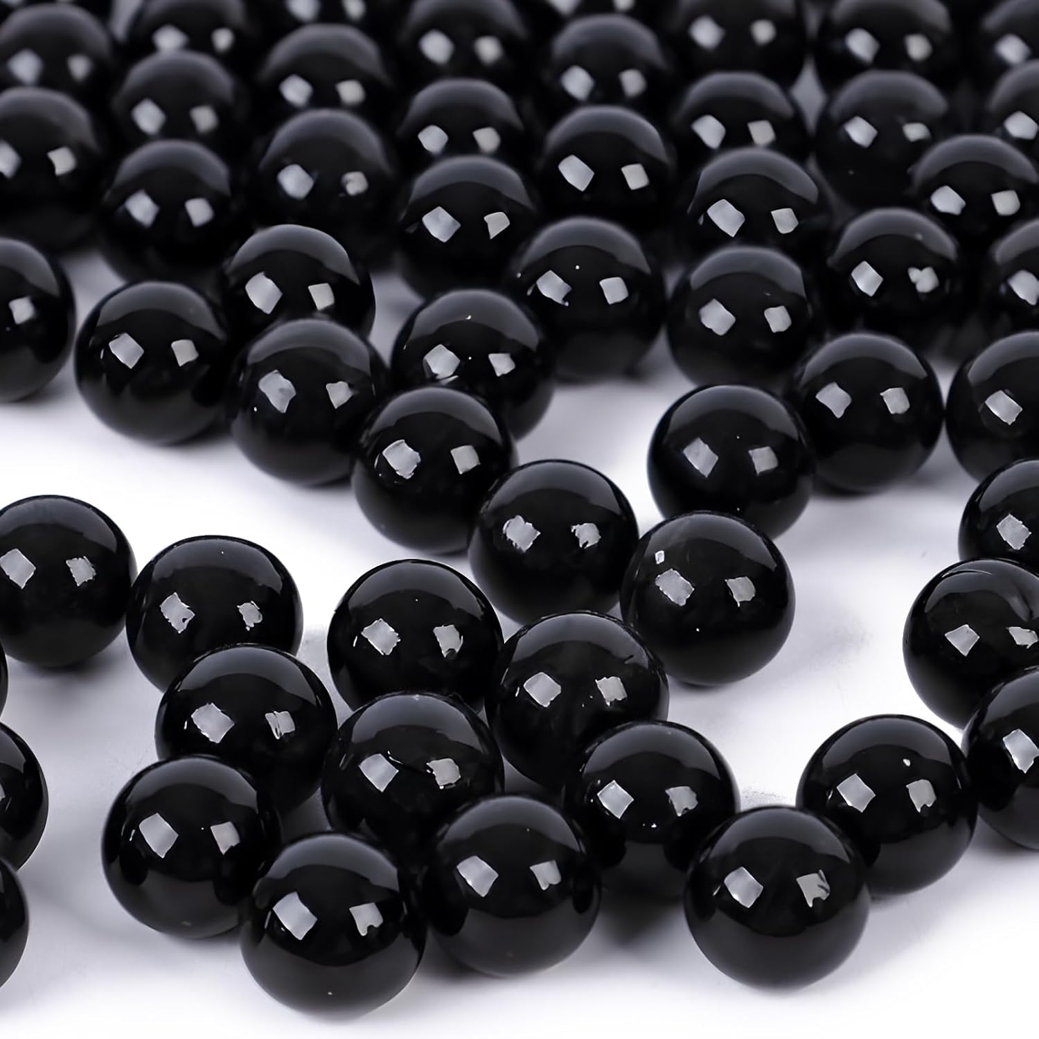 DomeStar one pound black glass marbles bulk front view showing premium shiny finish packaging box.